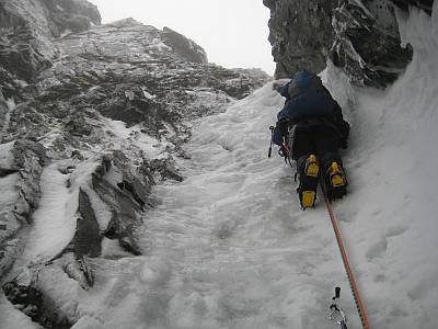 Peter on the steep ice of pitch 3